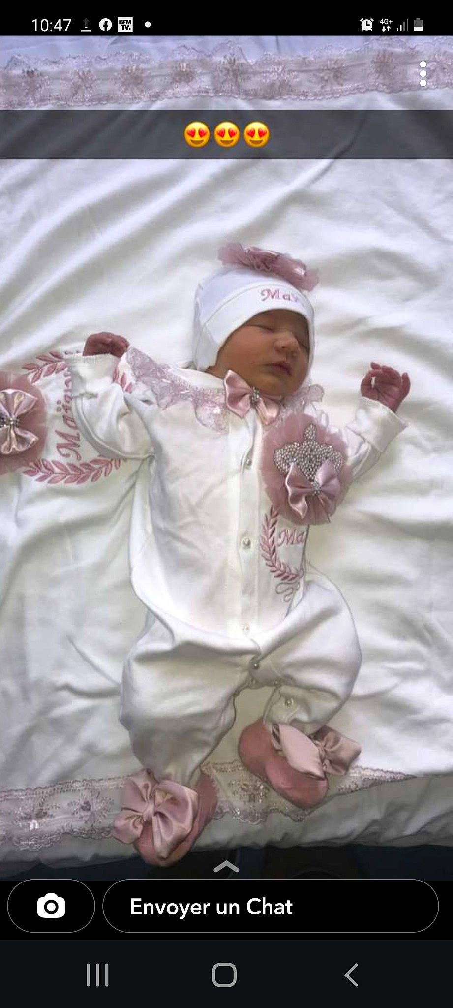 Maïvy participe au concours pour gagner de l'argent avec cette photo : baby, baby_toddler_clothing, cap, child, comfort, fun, fur, grass, happy, headwear, linens, magenta, peach, person, petal, pink, plant, sitting, sleeve, textile