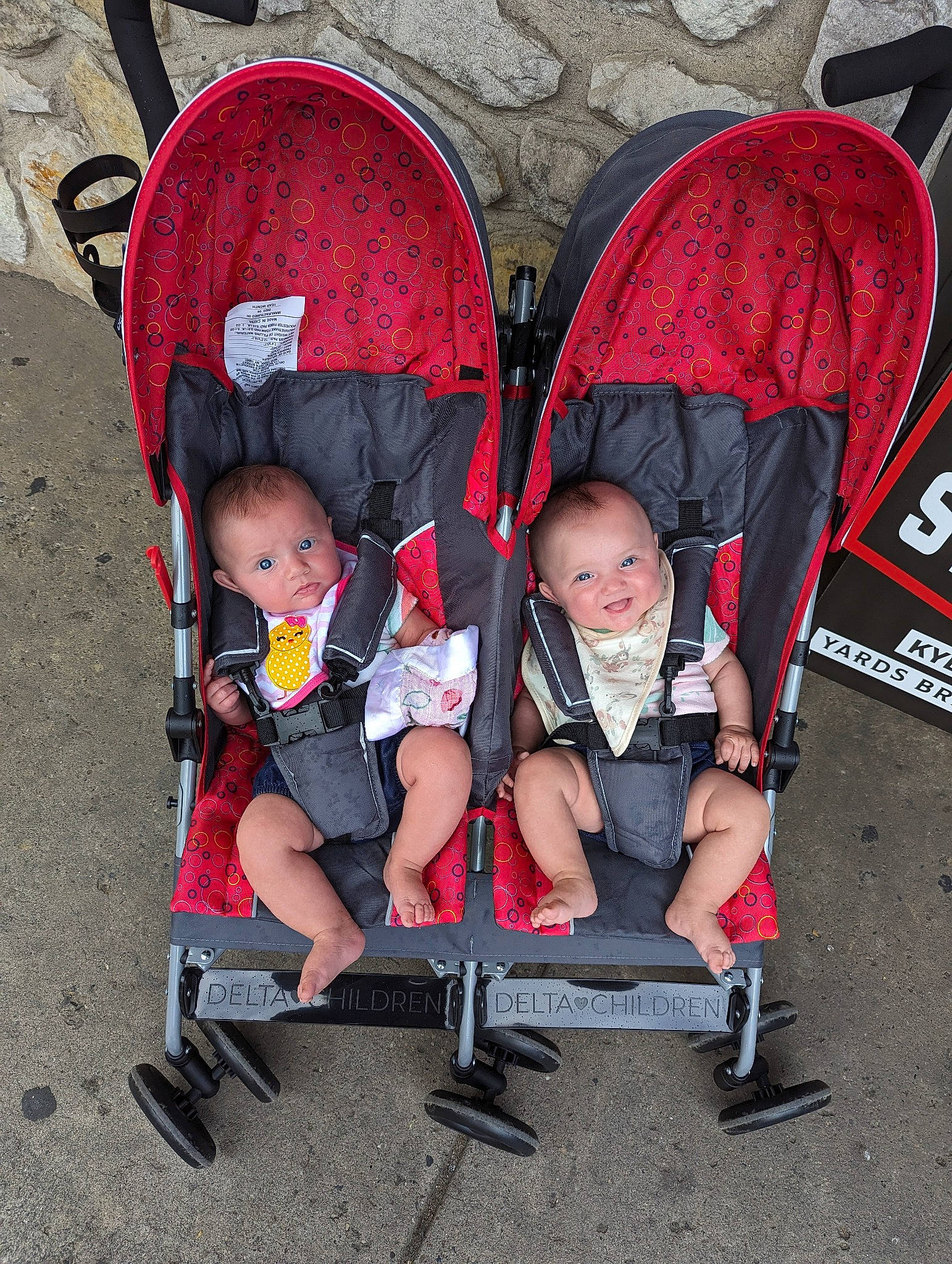 Sofia Sedona is registered to the contest to win money with this photo: baby, baby_carriage, baby_products, carmine, chair, child, comfort, eye, fun, head, lap, leisure, person, public_space, red, sitting, tire, toddler, travel, vacation