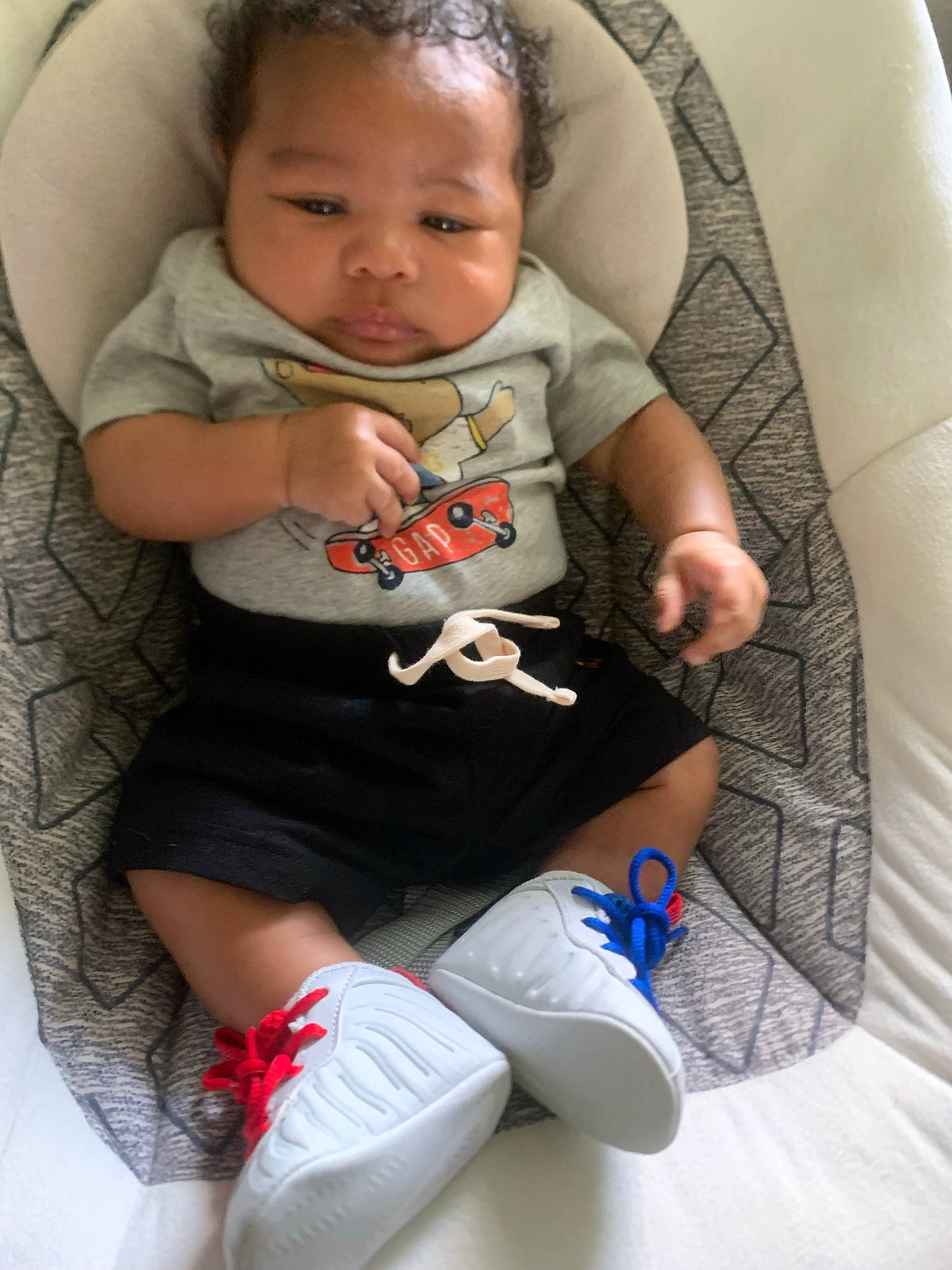 A Siah joined the competition — help win amazing prizes! baby, baby_toddler_clothing, chair, child, comfort, face, finger, hair, hairstyle, head, lap, linens, pattern, person, skin, sleeve, sock, t_shirt, textile, thigh