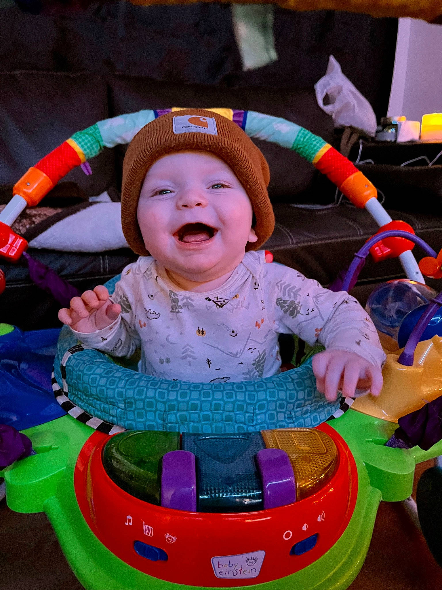 Chandler is registered to the contest to win money with this photo: baby, baby_products, baby_toddler_clothing, child, event, facial_expression, fun, happy, headwear, leisure, magenta, person, pink, play, purple, recreation, riding_toy, sitting, smile, snapshot