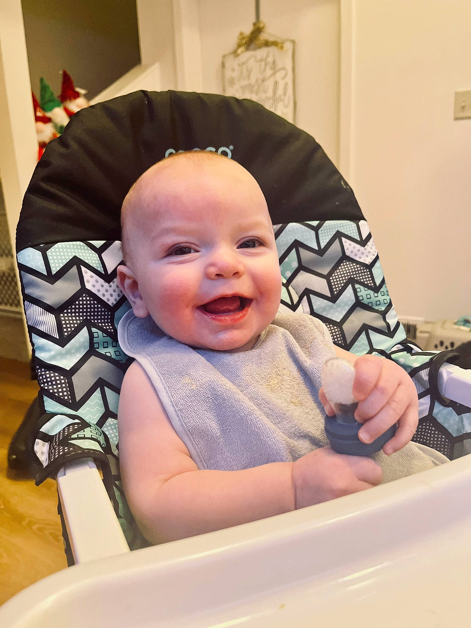 Chandler joined the competition — help win amazing prizes! baby, baby_laughing, baby_products, baby_safety, baby_toddler_clothing, cheek, child, comfort, fun, happy, laugh, pattern, person, picture_frame, room, sitting, sleeve, smile, thumb, toddler