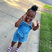 Treasure is registered to the contest to win money with this photo: child, toddler, denim_outfit, purple_sandals, sidewalk, grass, peace_sign, tongue_out, playful, outdoor, sunlight, happy, cute, portrait, summer, person, hair_puff, casual_clothing, fun, smiling