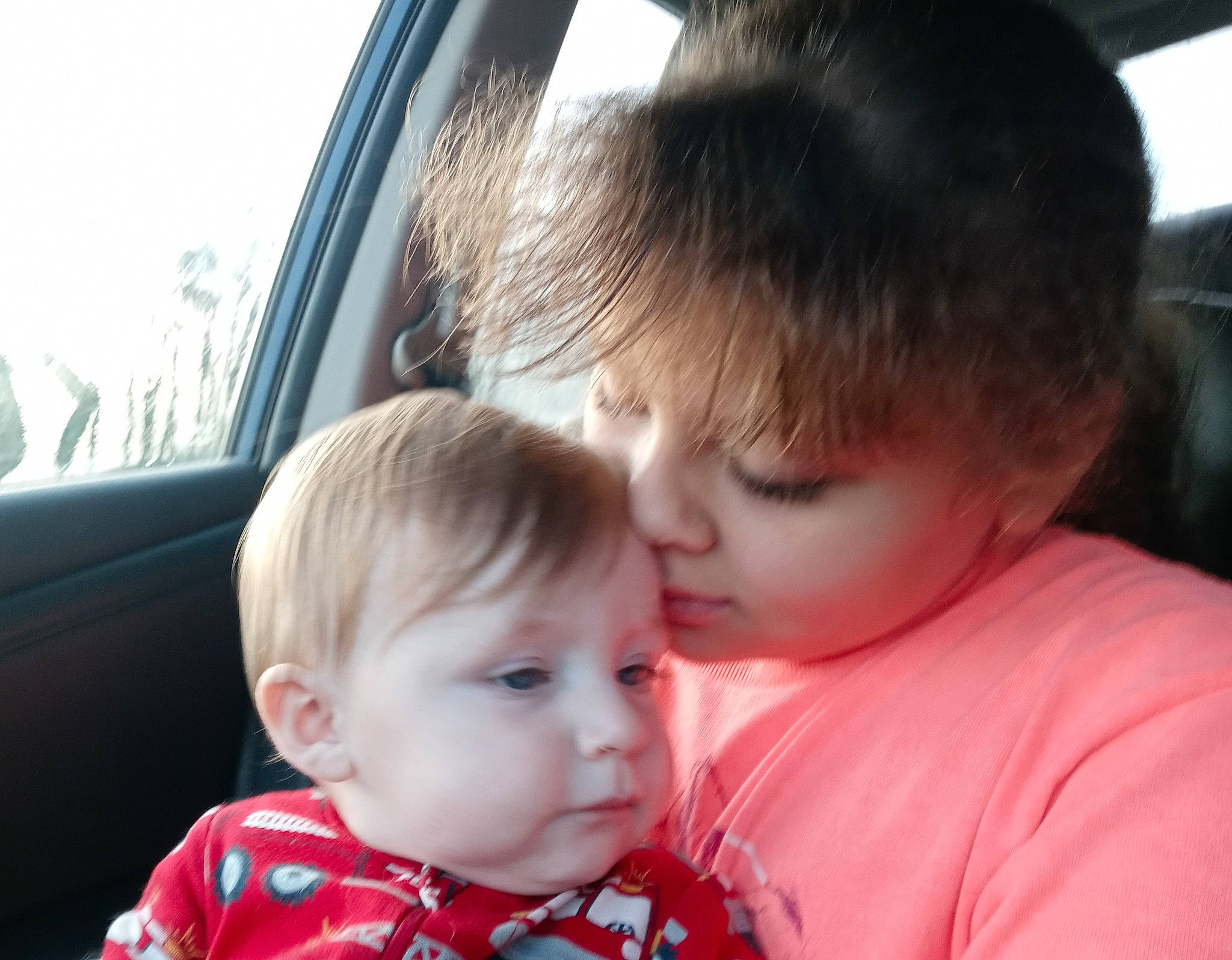 Isabella is registered to the contest to win money with this photo: auto_part, baby, baby_toddler_clothing, car, car_seat, cheek, child, family_car, fun, happy, interaction, luxury_vehicle, motor_vehicle, nose, pattern, person, sitting, toddler, vacation, vehicle