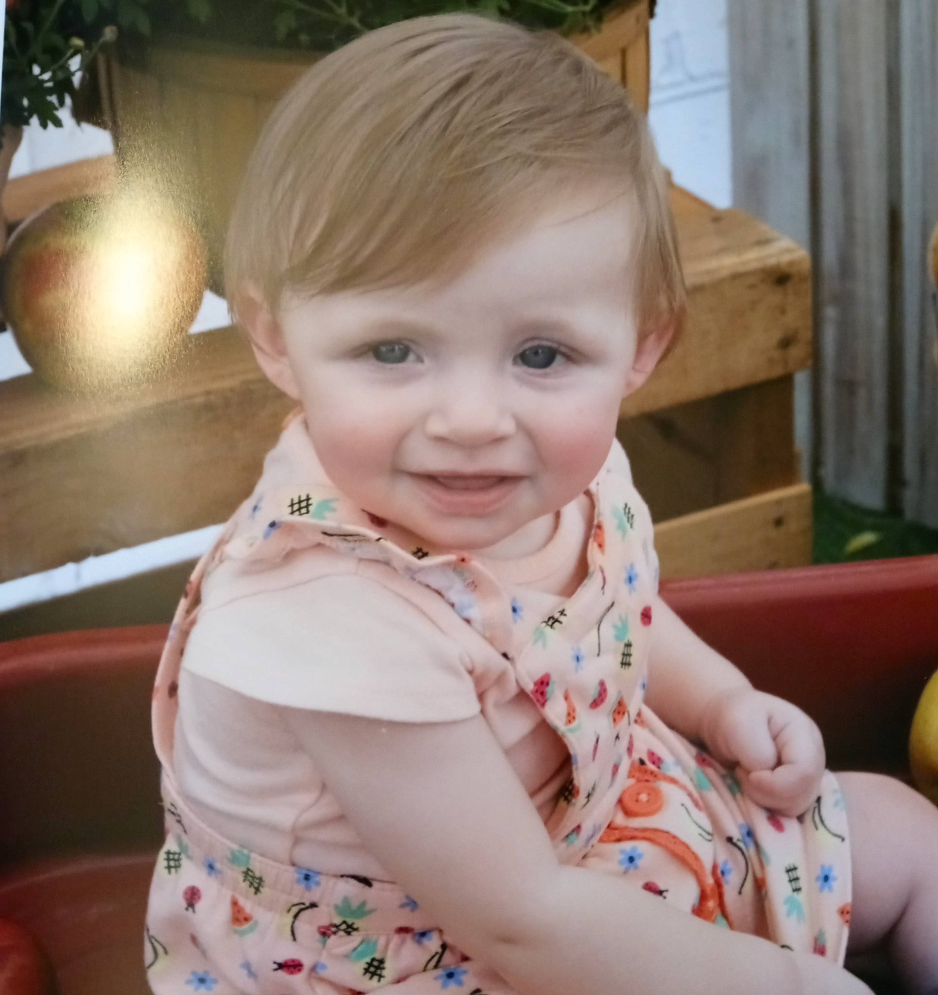 Isabella is registered to the contest to win money with this photo: arm, baby, baby_toddler_clothing, bangs, cheek, child, fun, happy, human_body, iris, joy, leisure, nose, pattern, person, sitting, skin, sleeve, smile, t_shirt