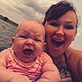 Willow joined the competition — help win amazing prizes! baby, woman, selfie, outdoor, lake, water, cloudy_sky, pink_clothing, tattoo, piercing, happy, laughing, nature, summer, arm, person, portrait, parent_and_child, fun, expression