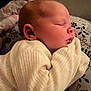 baby, sleeping, infant, closeup, face, cozy, sweater, pillow, pattern, bird, flower, soft, cute, child, peaceful, rest, indoors, newborn, skin