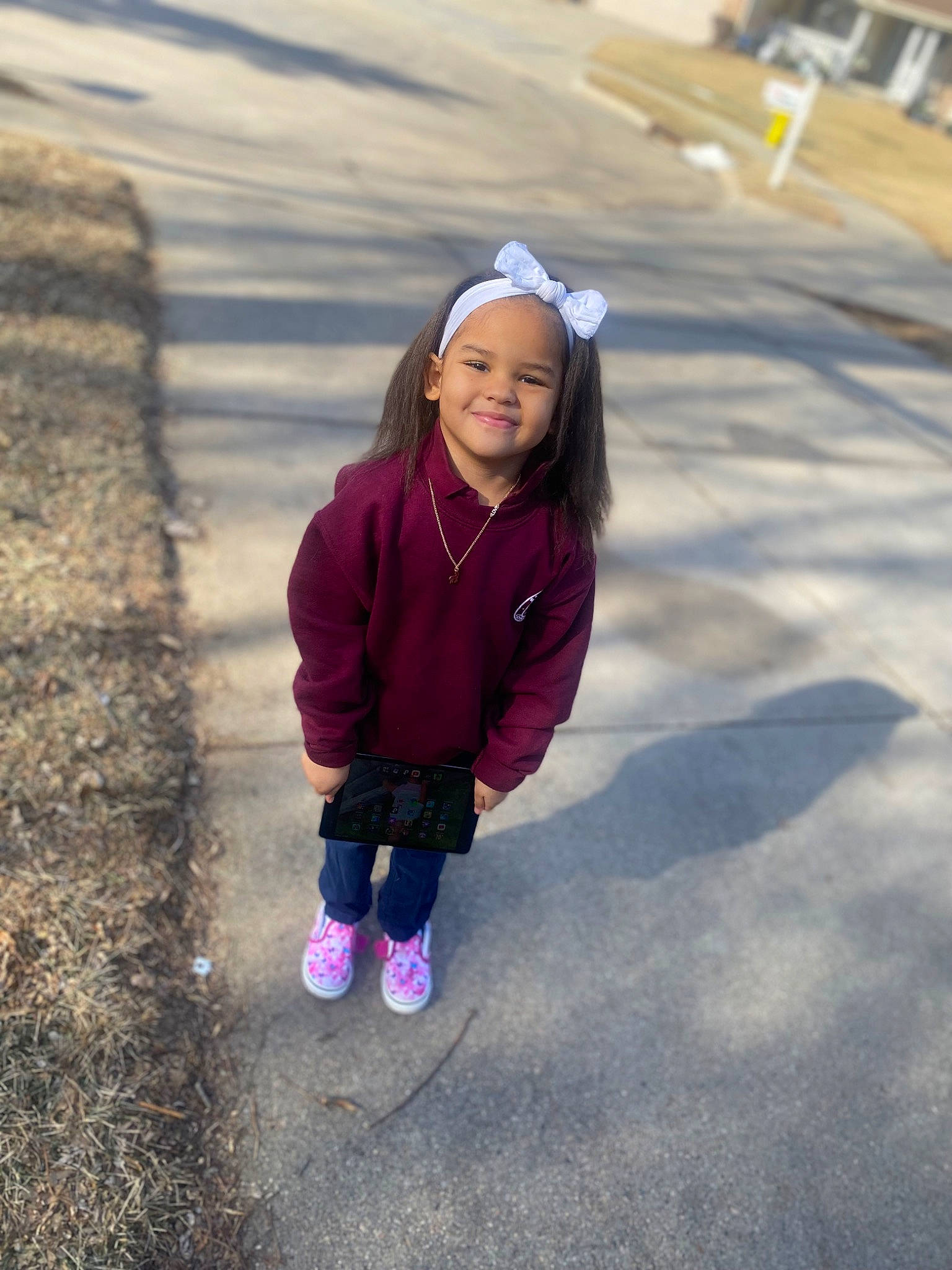 Amaya is registered to the contest to win money with this photo: asphalt, child, electric_blue, eye, freezing, fun, grass, happy, headwear, jacket, joy, landscape, leisure, magenta, people_in_nature, person, recreation, road_surface, sand, smile