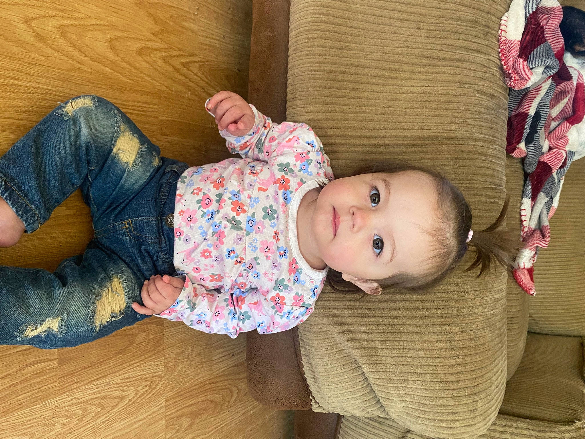 Jaelen is registered to the contest to win money with this photo: baby, baby_toddler_clothing, cheek, child, comfort, flooring, foot, hardwood, headgear, human_leg, pattern, person, pink, room, sitting, skin, sleeve, smile, thigh, toddler