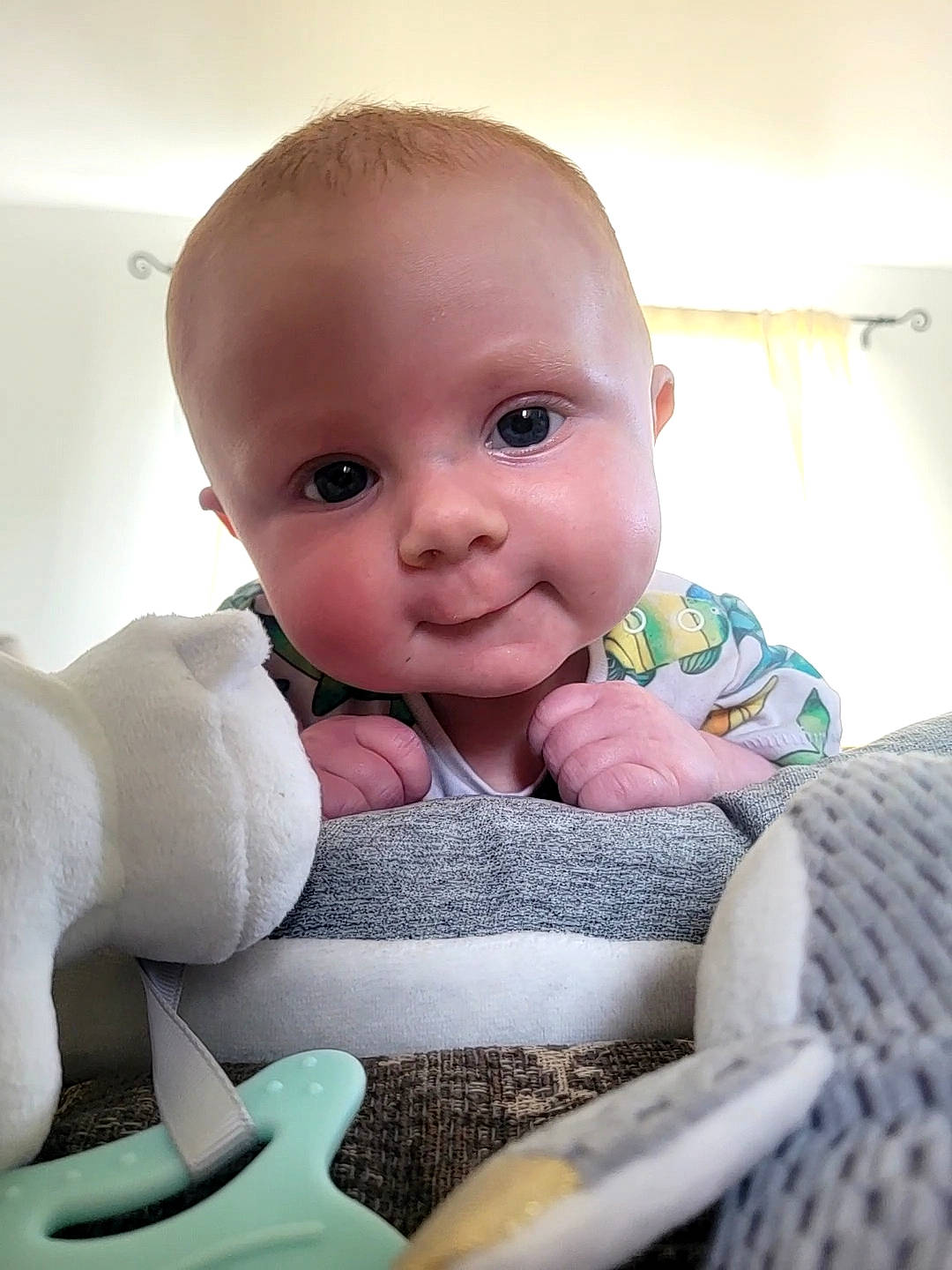 Finley is registered to the contest to win money with this photo: baby, baby_products, baby_toddler_clothing, cheek, child, chin, comfort, eye, eyebrow, facial_expression, finger, fun, hairstyle, happy, iris, lip, mouth, nose, person, skin