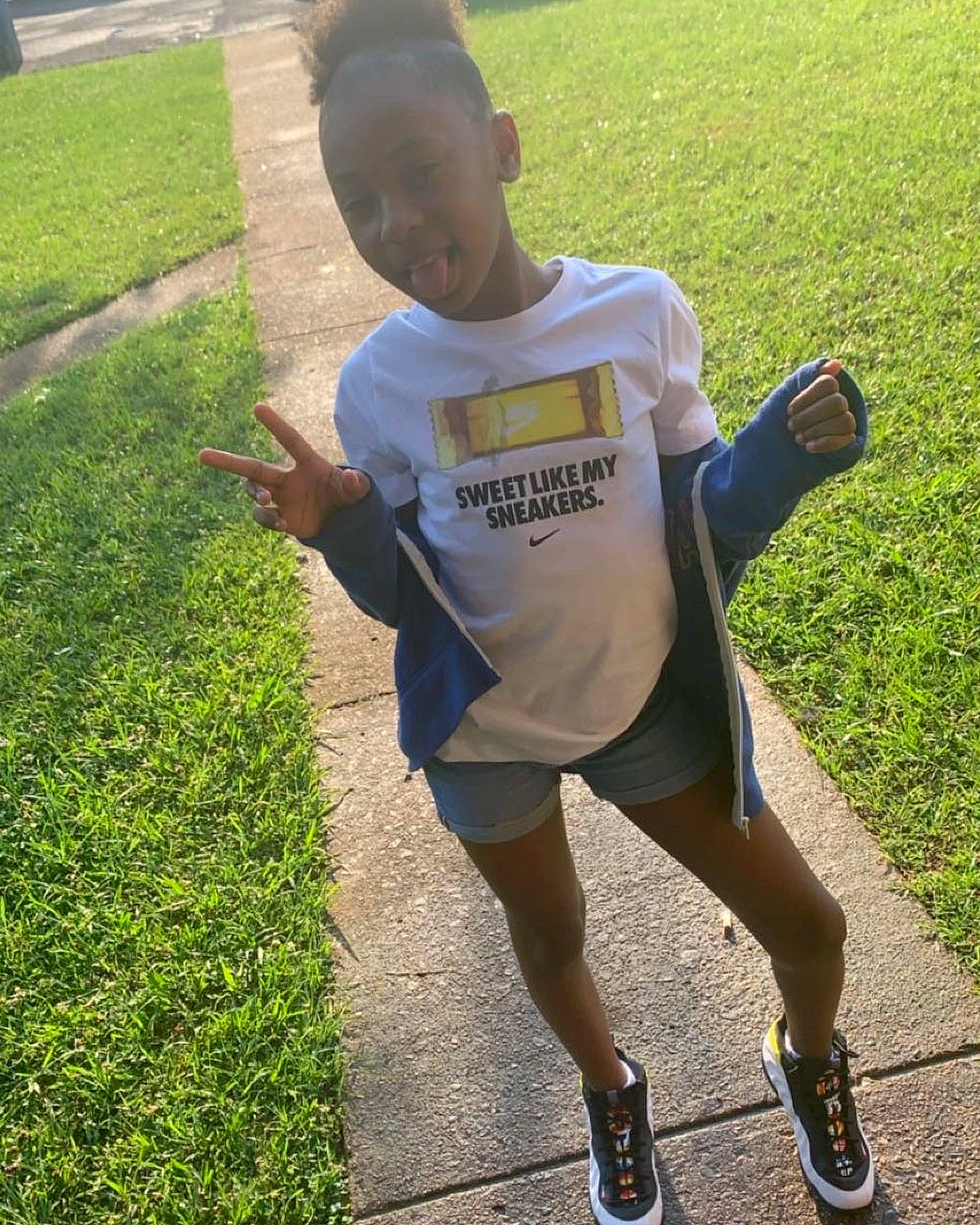 Janiyah joined the competition — help win amazing prizes! asphalt, athlete, exercise, grass, green, human_leg, knee, leg, leisure, outdoor_recreation, person, recreation, running, shoe, shorts, sleeve, sneakers, sports_uniform, sportswear, t_shirt