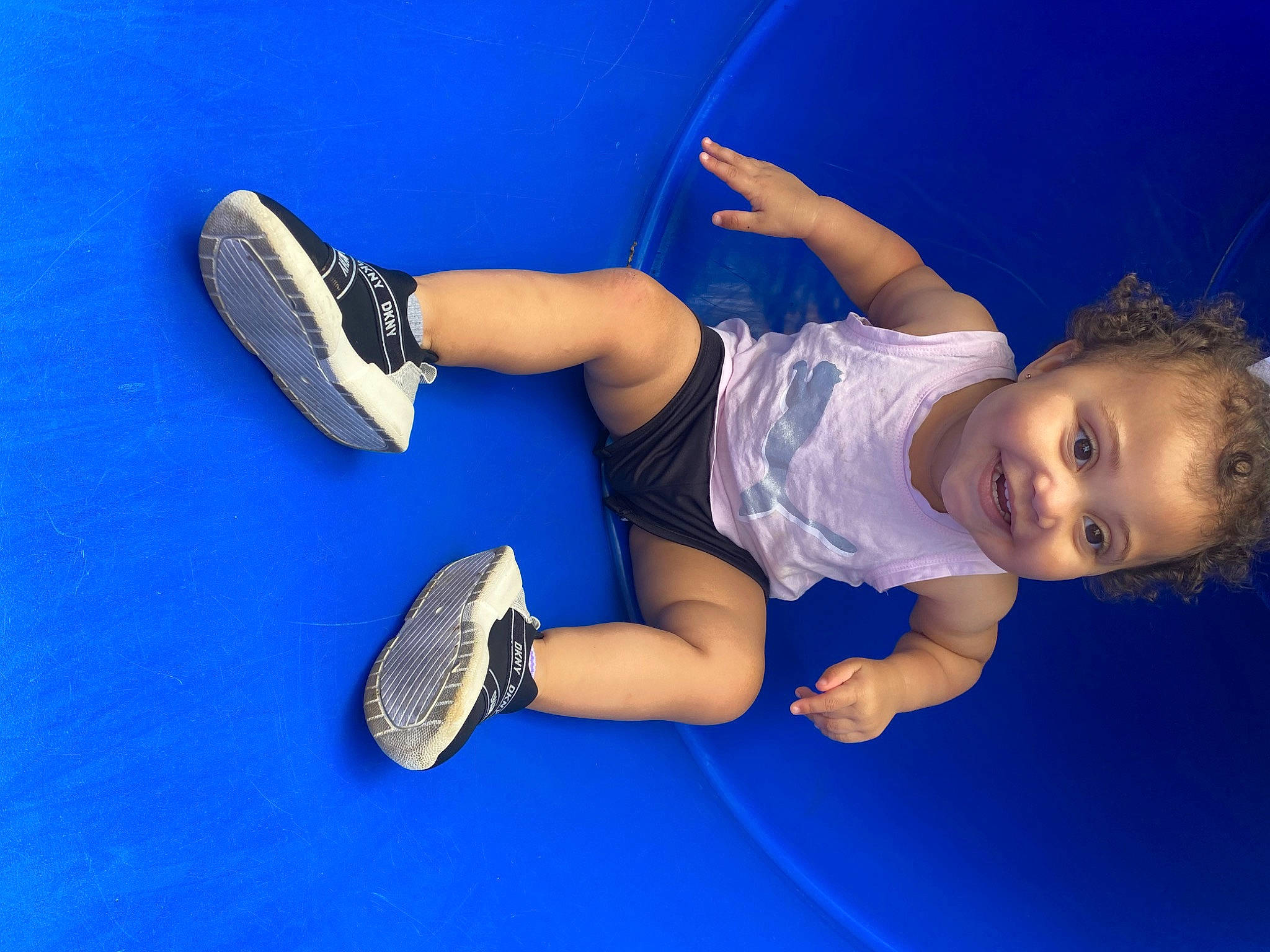 Taytum is registered to the contest to win money with this photo: azure, cloud, elbow, electric_blue, entertainment, finger, flash_photography, footwear, happy, joint, joy, knee, leg, leisure, person, plant, shoe, sneakers, sportswear, thigh