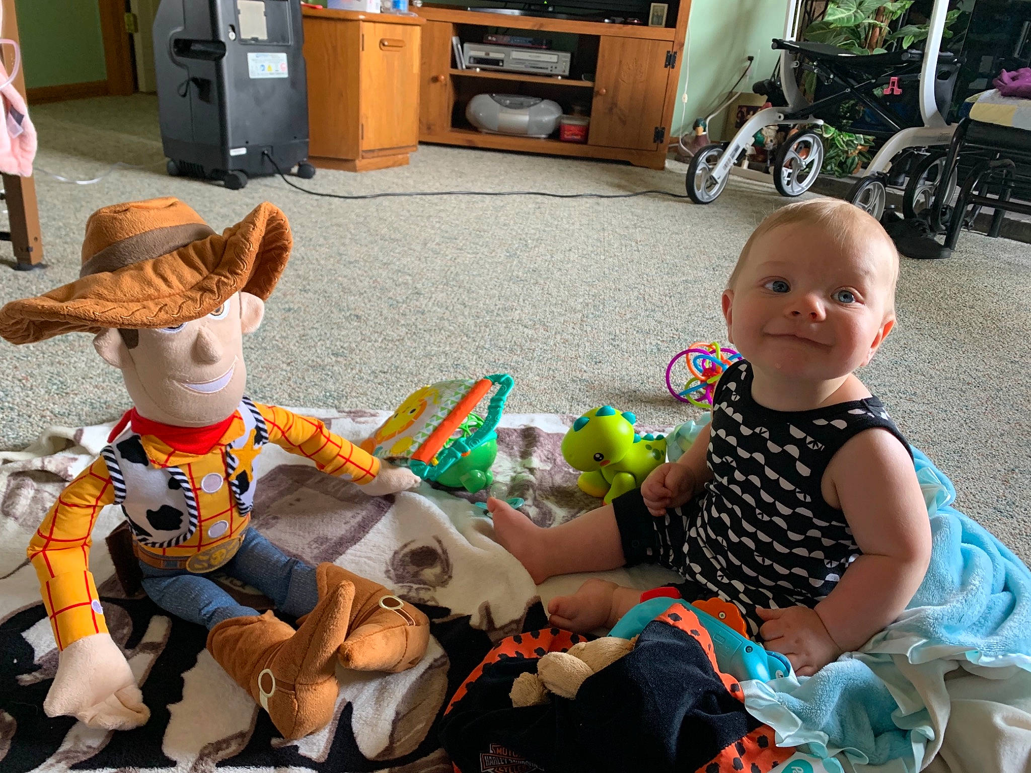 Kash joined the competition — help win amazing prizes! baby_toddler_clothing, cabinetry, cupboard, doll, drawer, event, flooring, fun, joy, leisure, person, photograph, product, smile, snapshot, stuffed_toy, tire, toddler, toy, wheel