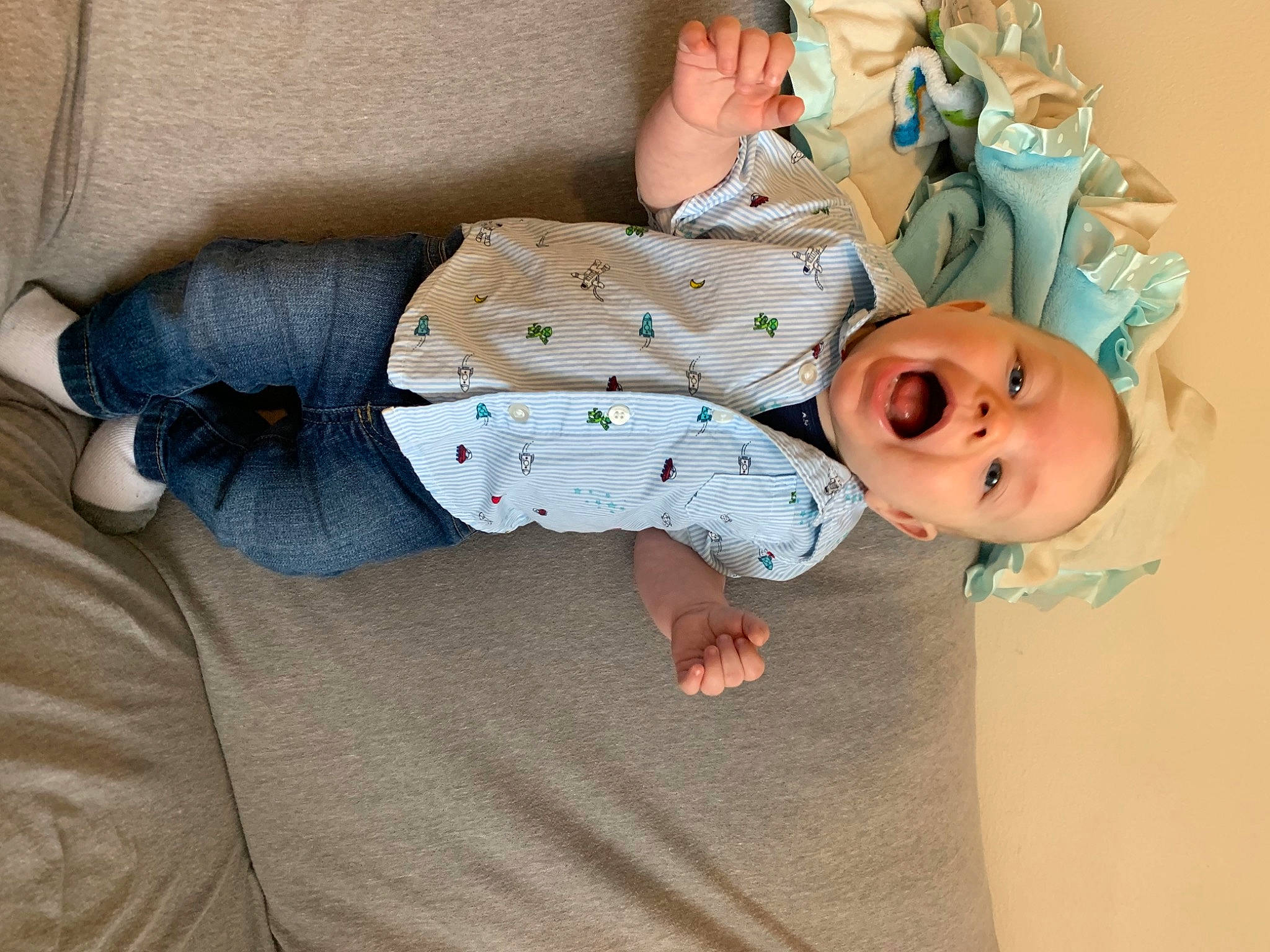 Kash is registered to the contest to win money with this photo: baby, baby_products, baby_sleeping, baby_toddler_clothing, bedtime, child, comfort, flooring, foot, happy, hat, linens, pattern, person, room, sitting, sleeve, smile, sock, toddler