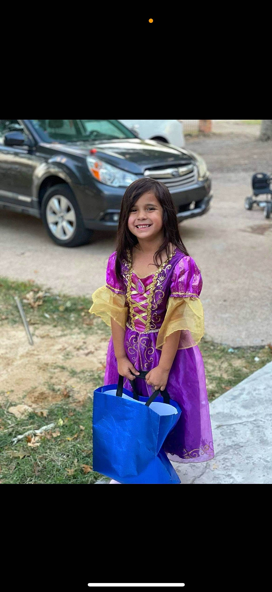 Izabella is registered to the contest to win money with this photo: asphalt, automotive_design, automotive_exterior, automotive_lighting, automotive_tire, bumper, car, dress, electric_blue, event, happy, joy, magenta, motor_vehicle, person, personal_luxury_car, smile, snapshot, tire, travel