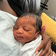 Ace joined the competition — help win amazing prizes! newborn, baby, infant, sleeping, person, hand, nails, manicure, white_clothing, couch, pillow, yellow_pillow, close_up, indoor, skin, face, peaceful, resting, holding, comfort