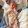 newborn, baby, infant, hospital, bassinet, blanket, mittens, onesie, floral, pink, sleepy, cozy, soft, towel, bed, person, portrait, cute, small, resting