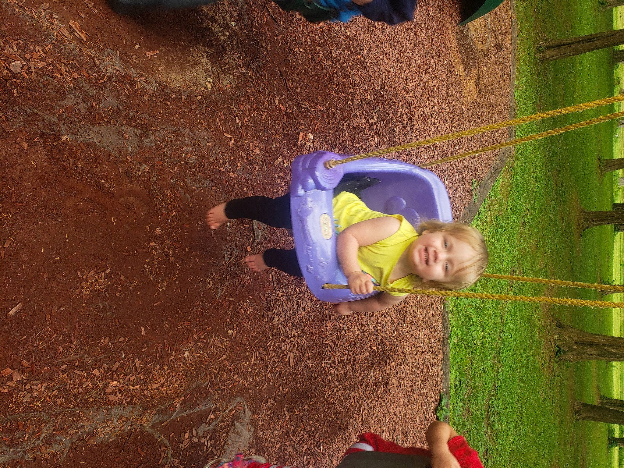 Avelyn is registered to the contest to win money with this photo: baby, baby_toddler_clothing, child, city, electric_blue, flooring, fun, grass, joy, landscape, leisure, outdoor_play_equipment, people_in_nature, person, play, playground, recreation, shadow, smile, soil