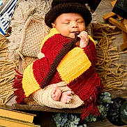 Viraj Reddy joined the competition — help win amazing prizes! baby, sleeping, knitted_blanket, hat, wooden_bed, cushion, decor, books, flowers, cozy, indoors, peaceful, infant, wrapped, soft, floor, homedecor, child, cute, resting