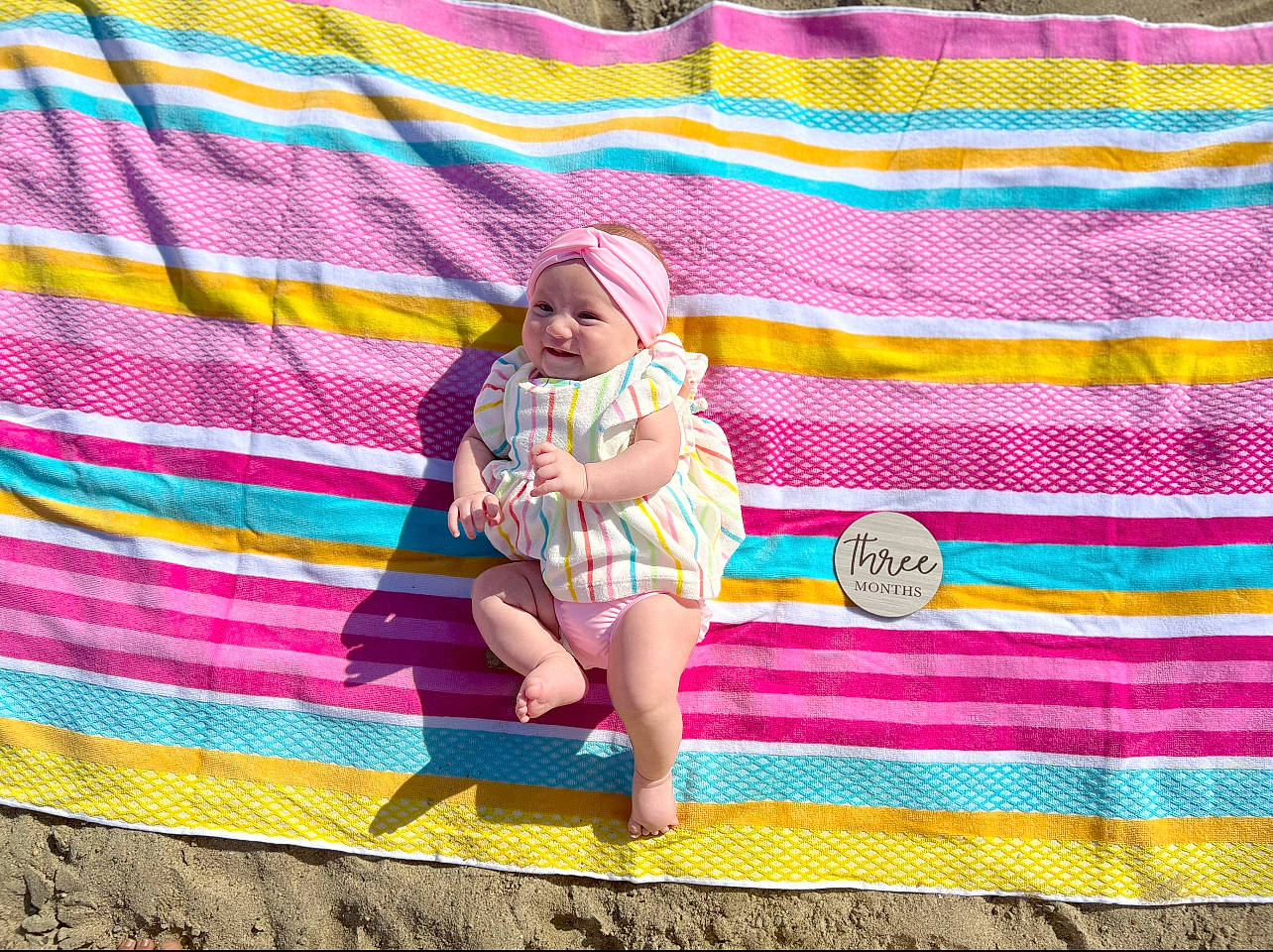Kayleen joined the competition — help win amazing prizes! art, baby_toddler_clothing, electric_blue, fun, headwear, human_leg, leisure, linens, magenta, pattern, people_in_nature, person, pink, plaid, recreation, rectangle, sandal, sitting, tartan, textile