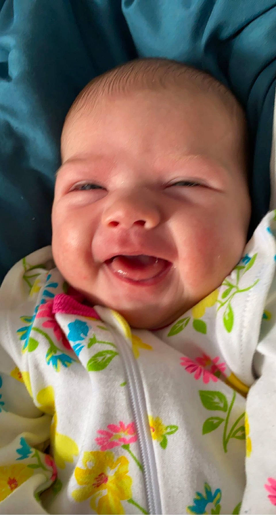 Melody is registered to the contest to win money with this photo: baby, baby_toddler_clothing, cheek, child, chin, comfort, eyebrow, facial_expression, grass, happy, human_body, iris, lip, mouth, nose, person, pink, product, skin, smile