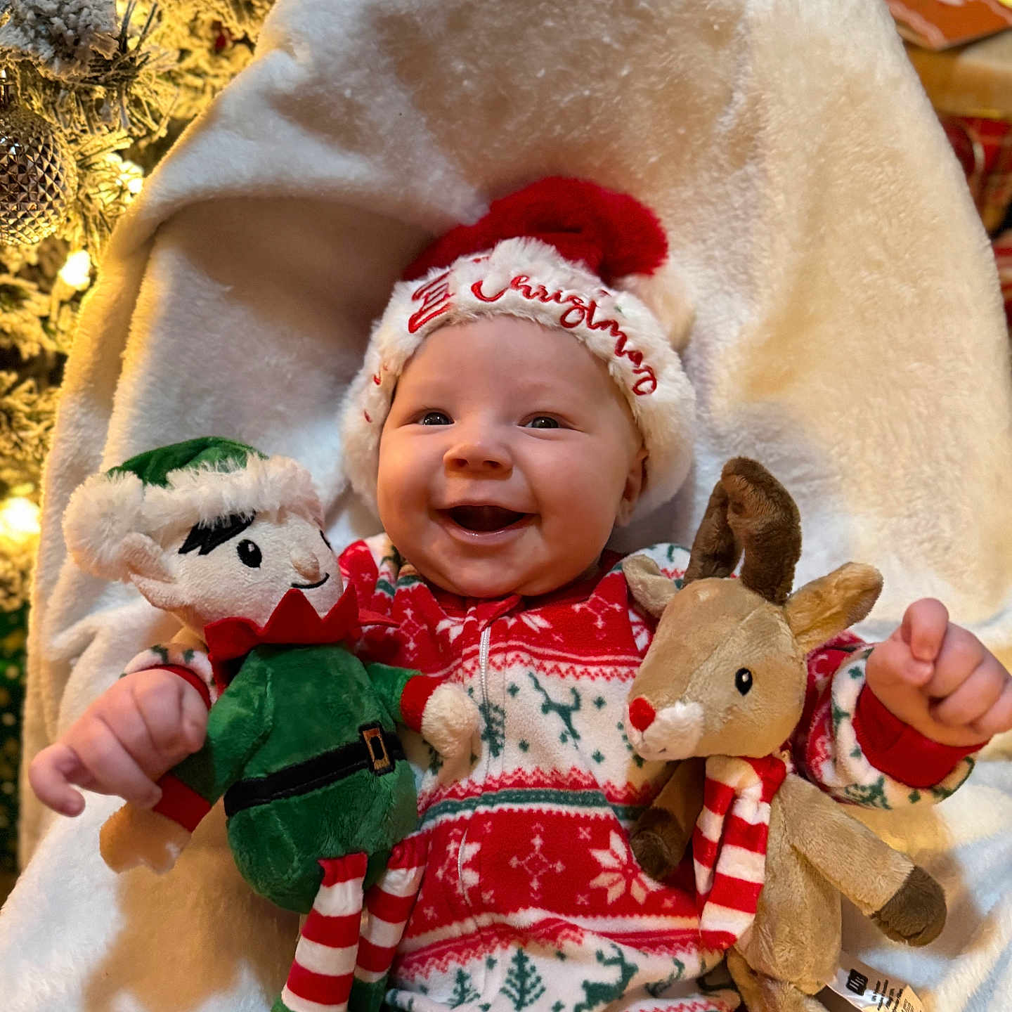 Mason joined the competition — help win amazing prizes! baby, blanket, bodypart, bonnet, cap, clothing, doll, face, finger, hand, happy, hat, head, newborn, person, photography, portrait, smile, teddybear, toy