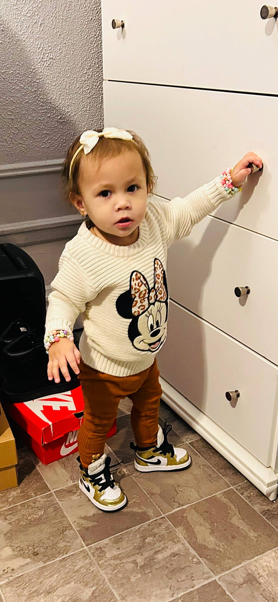 Jayliah joined the competition — help win amazing prizes! baby, baby_toddler_clothing, bag, box, cabinetry, carton, child, floor, flooring, happy, luggage_and_bags, pattern, person, product, shipping_box, shoe, sleeve, standing, toddler, walking_shoe