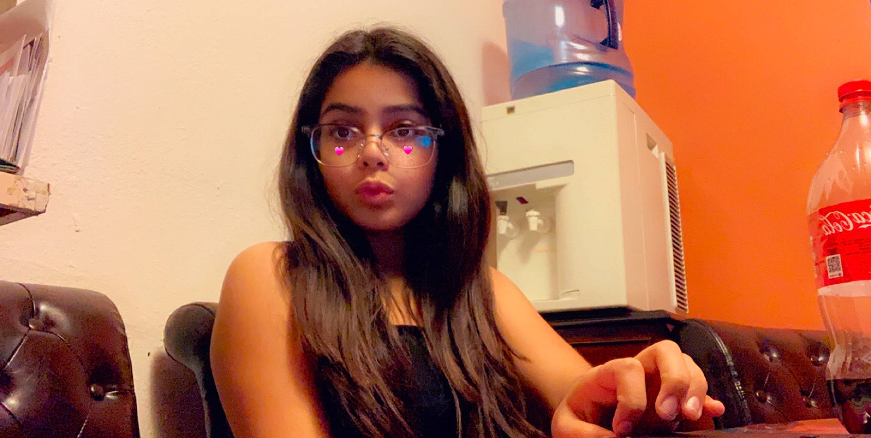 Allisson joined the competition — help win amazing prizes! black_hair, brown_hair, eyebrow, eyewear, face, finger, fun, glasses, hair, hairstyle, hand, lip, long_hair, mouth, neck, person, photography, sitting, smile, sunglasses