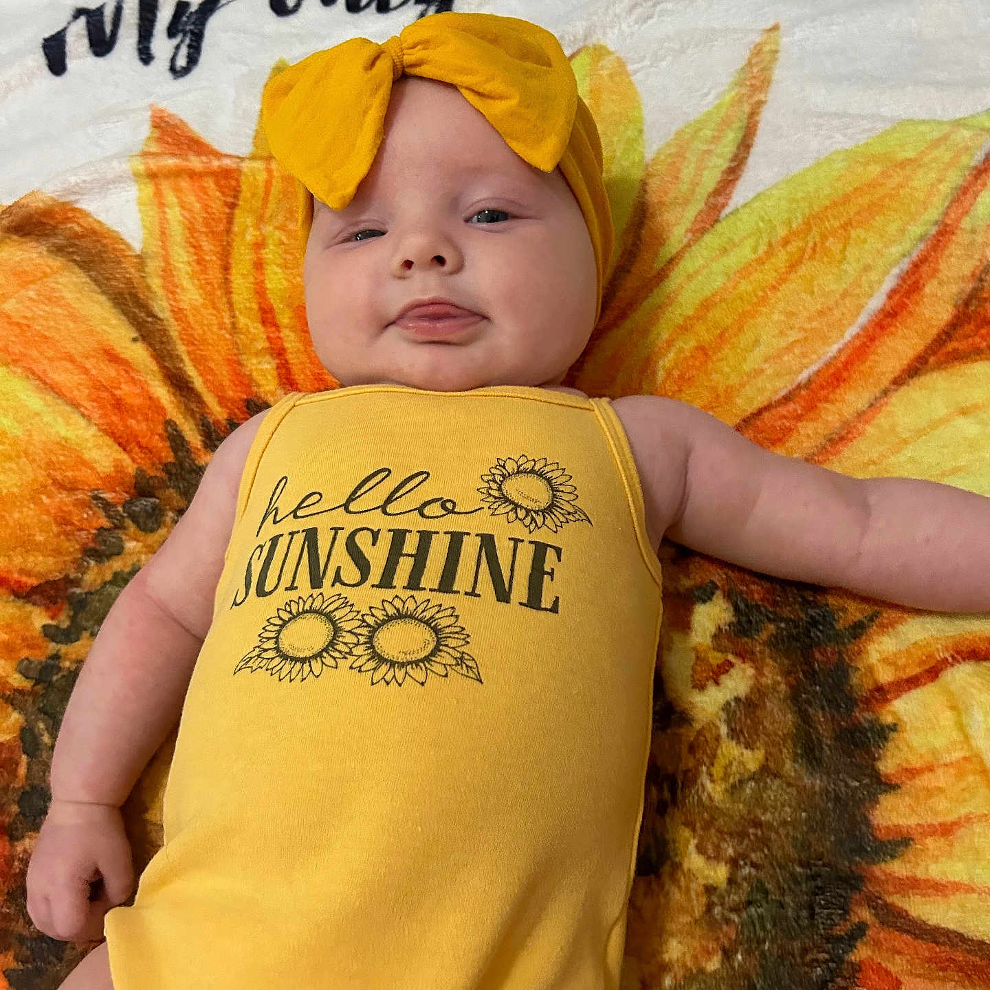Scarlett joined the competition — help win amazing prizes! accessories, baby, baseballcap, bed, blanket, cap, clothing, cushion, face, furniture, hat, head, homedecor, newborn, person, photography, portrait, quilt, sleeping, t_shirt
