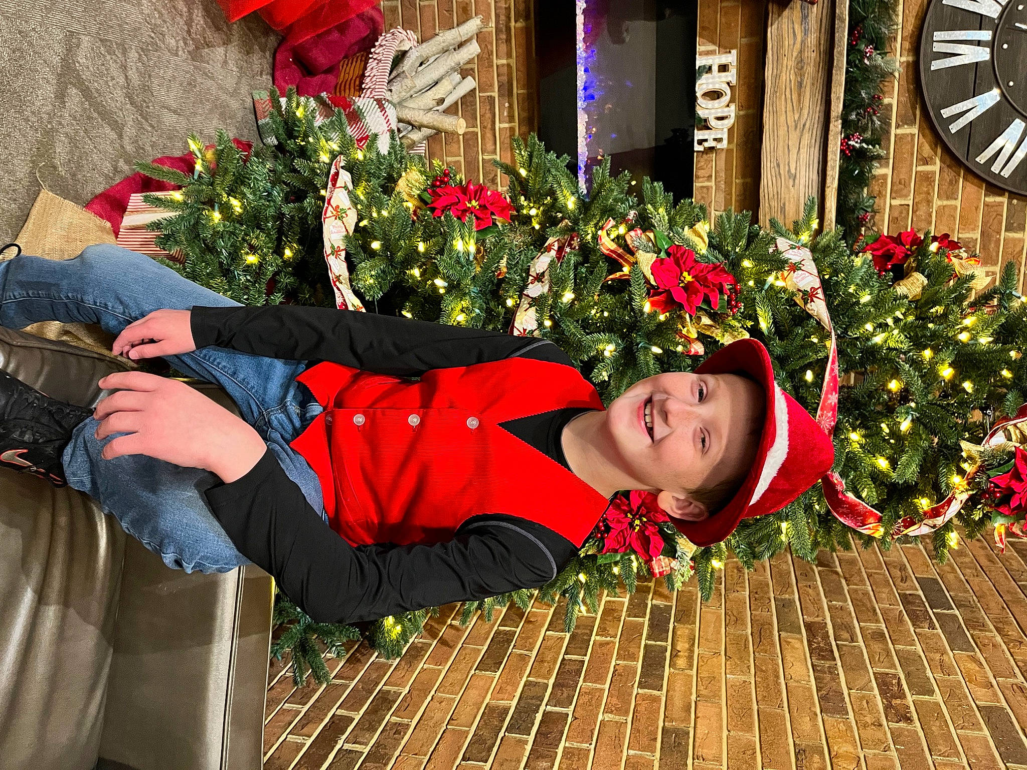 Bradyn joined the competition — help win amazing prizes! annual_plant, carmine, event, floral_design, floristry, flower, flower_arranging, fun, grass, happy, hat, headwear, human_leg, joy, leisure, orange, people_in_nature, person, petal, plant