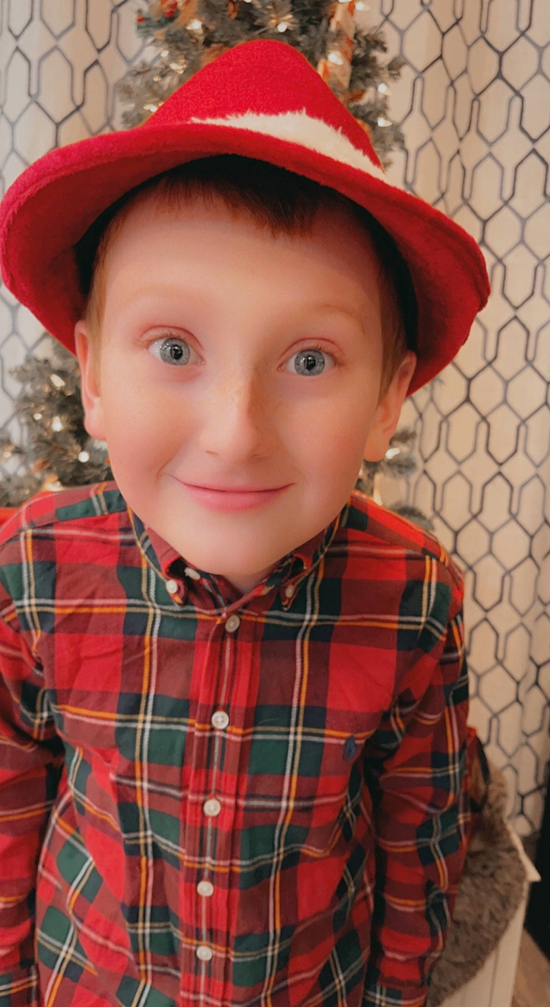 Bradyn joined the competition — help win amazing prizes! chin, collar, dress_shirt, eye, face, happy, hat, head, headgear, headwear, iris, joy, lip, nose, organ, person, plaid, red, sleeve, smile