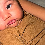 Jazer joined the competition — help win amazing prizes! baby, closeup, face, skin, eye, lip, hand, fingers, fabric, clothing, brown, texture, infant, newborn, portrait, cute, child, person, human, soft
