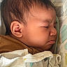 Jazer joined the competition — help win amazing prizes! baby, infant, face, profile, sleeping, blanket, cute, expression, pout, skin, ear, hair, child, young, soft, cozy, indoors, texture, closeup, wrapped