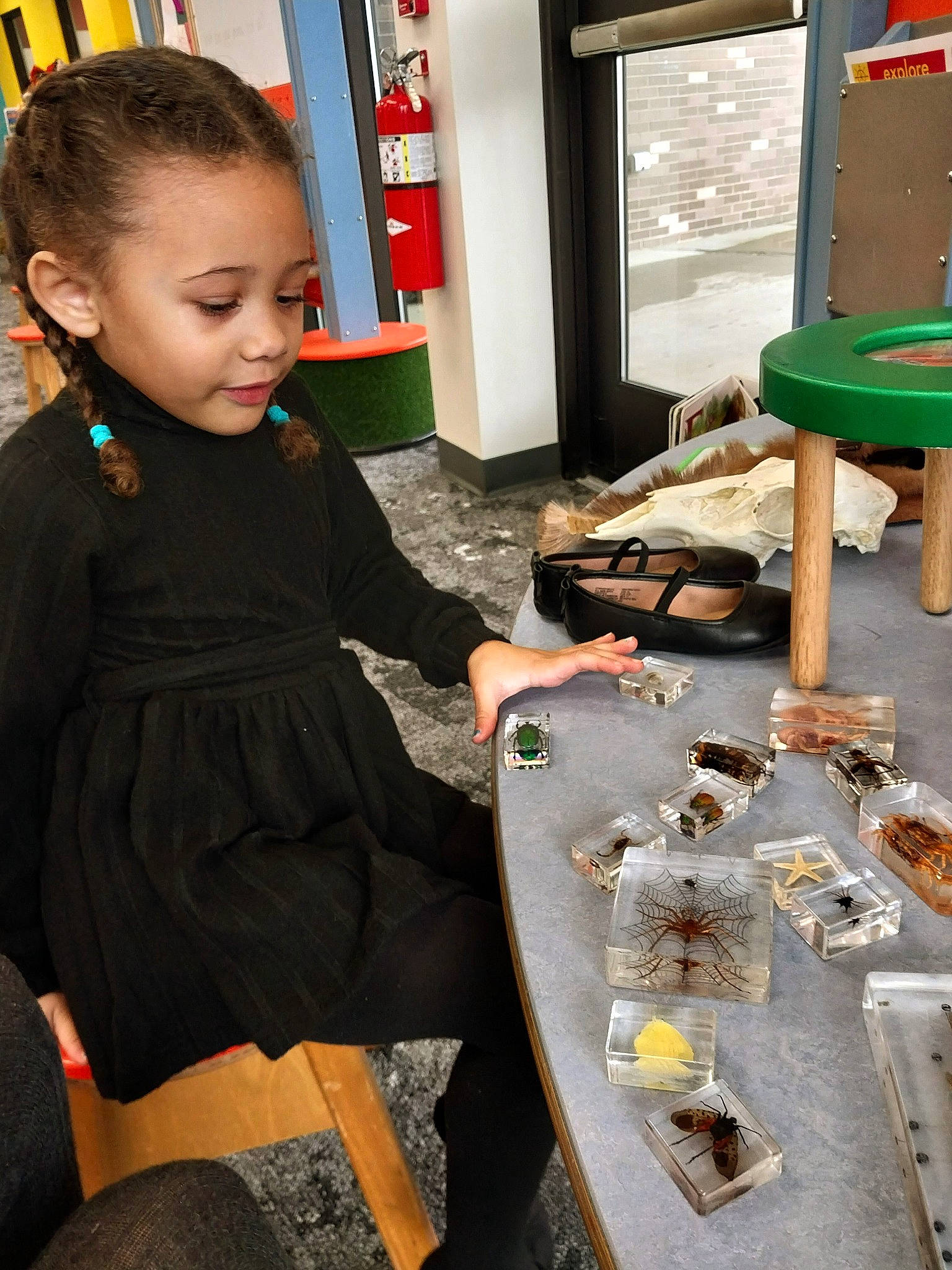 Avyanna is registered to the contest to win money with this photo: artisan, artist, chair, comfort_food, cooking, cuisine, dress, engineering, fashion_design, fun, human_leg, indoor_games_and_sports, machine, person, recreation, room, t_shirt, table, thigh, toddler