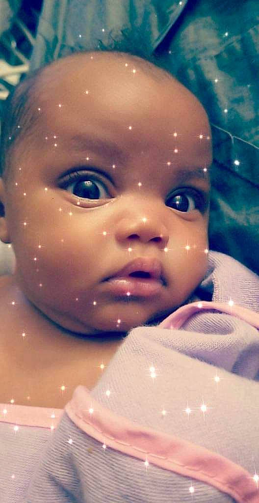 Sa'Niyah is registered to the contest to win money with this photo: baby, bathing, cheek, child, close_up, eye, face, forehead, fun, head, iris, lip, nose, person, skin, sky, smile, toddler