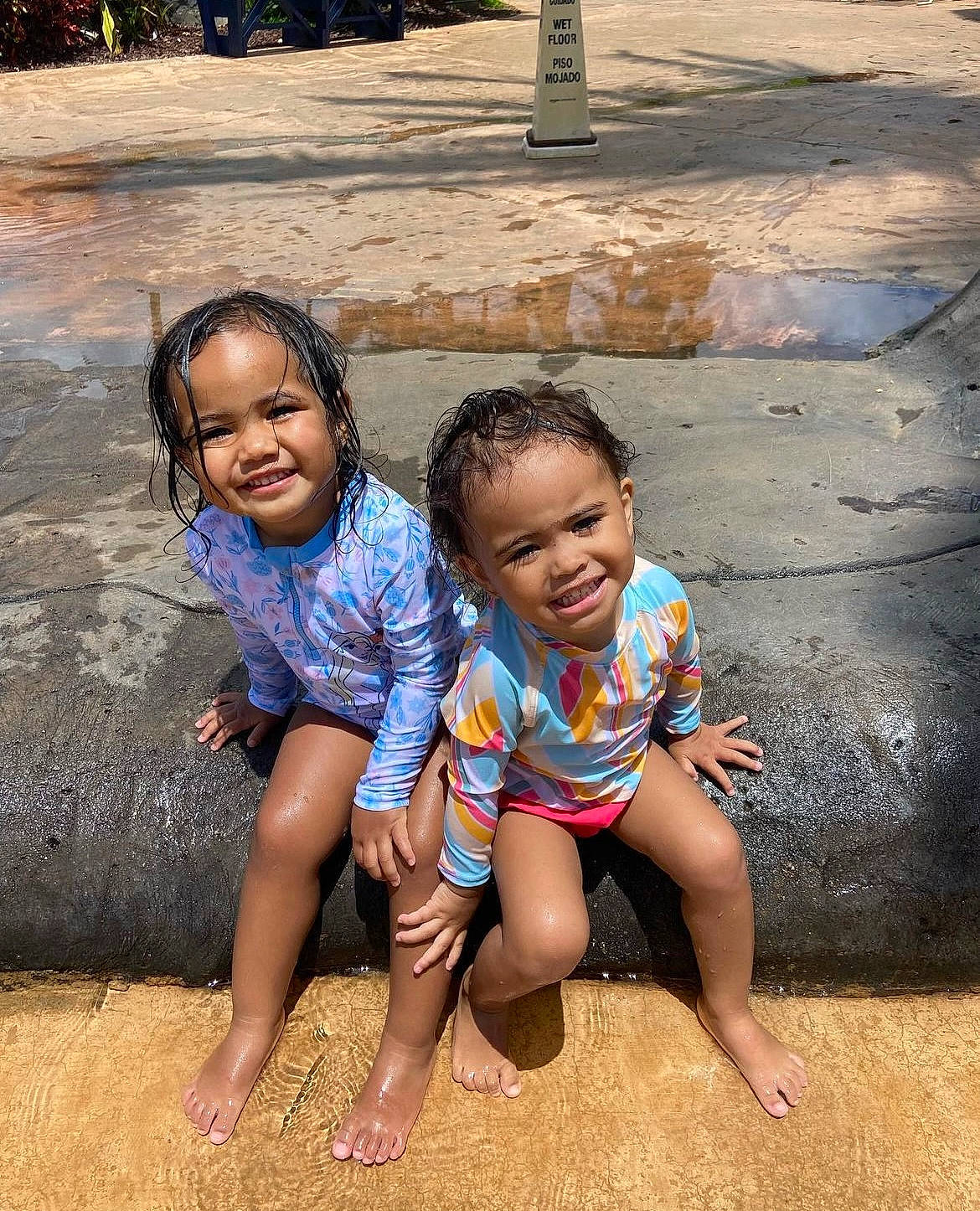 Melanie joined the competition — help win amazing prizes! adaptation, barefoot, child, face, foot, fun, grass, happy, joy, leisure, people_in_nature, person, sitting, skin, smile, soil, summer, t_shirt, toddler, tree