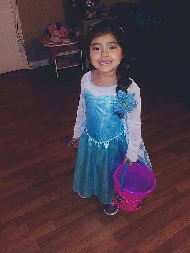 Angelina is registered to the contest to win money with this photo: baby_toddler_clothing, dress, electric_blue, embellishment, event, fashion_design, floor, flooring, formal_wear, happy, hardwood, joy, magenta, person, purple, sleeve, smile, toddler, trunk, varnish