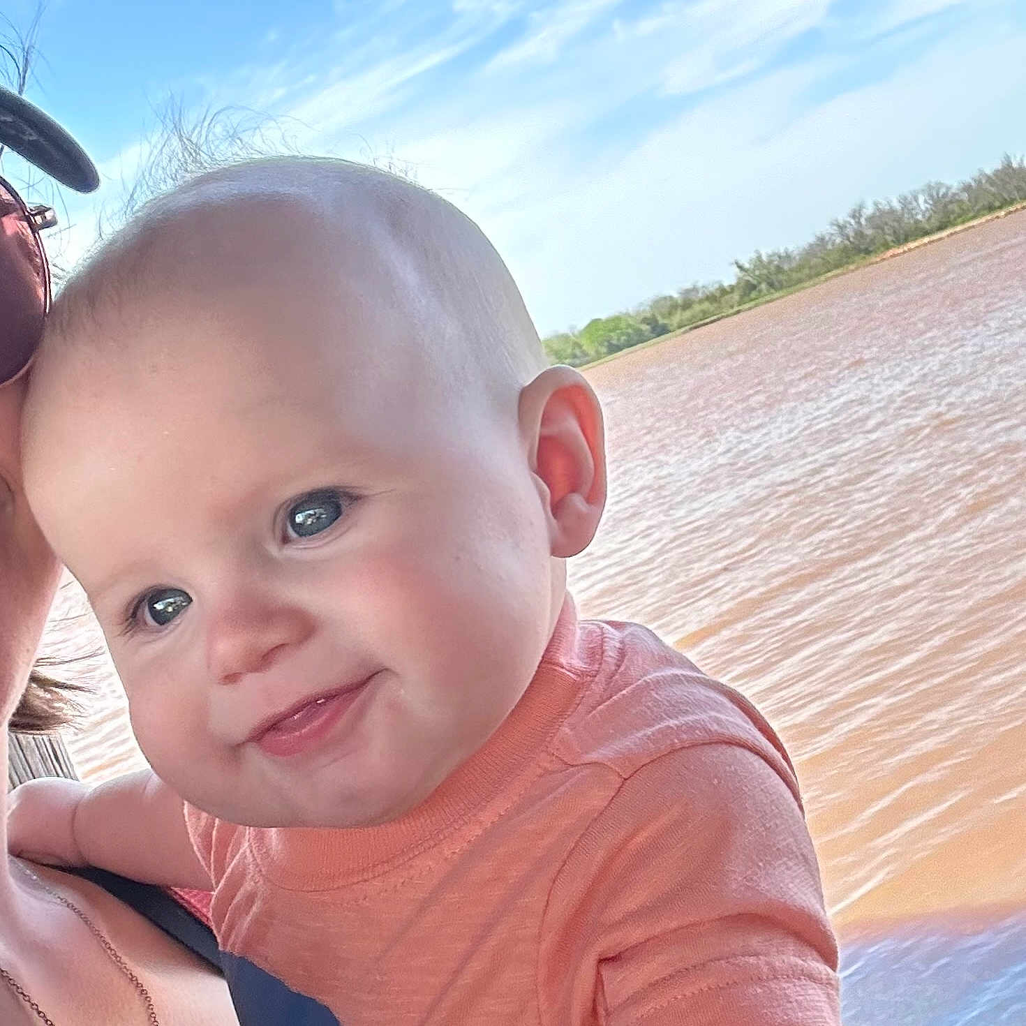 Andy Wayne is registered to the contest to win money with this photo: baby, beach, clothing, coast, face, happy, head, laughing, nature, outdoors, person, photography, portrait, sea, selfie, shoreline, sky, smile, t_shirt, water