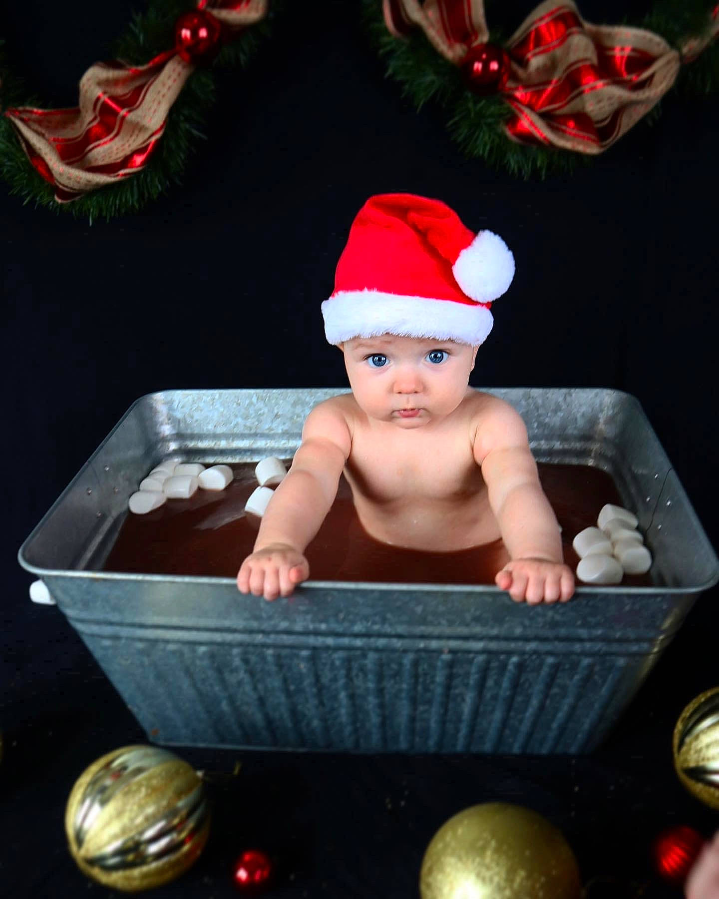 Blakely is registered to the contest to win money with this photo: baby, baby_products, baby_safety, baby_toddler_clothing, baby_toys, basket, box, cap, carmine, child, costume_hat, fashion_accessory, headwear, holiday, linens, person, plastic, product, red, sitting