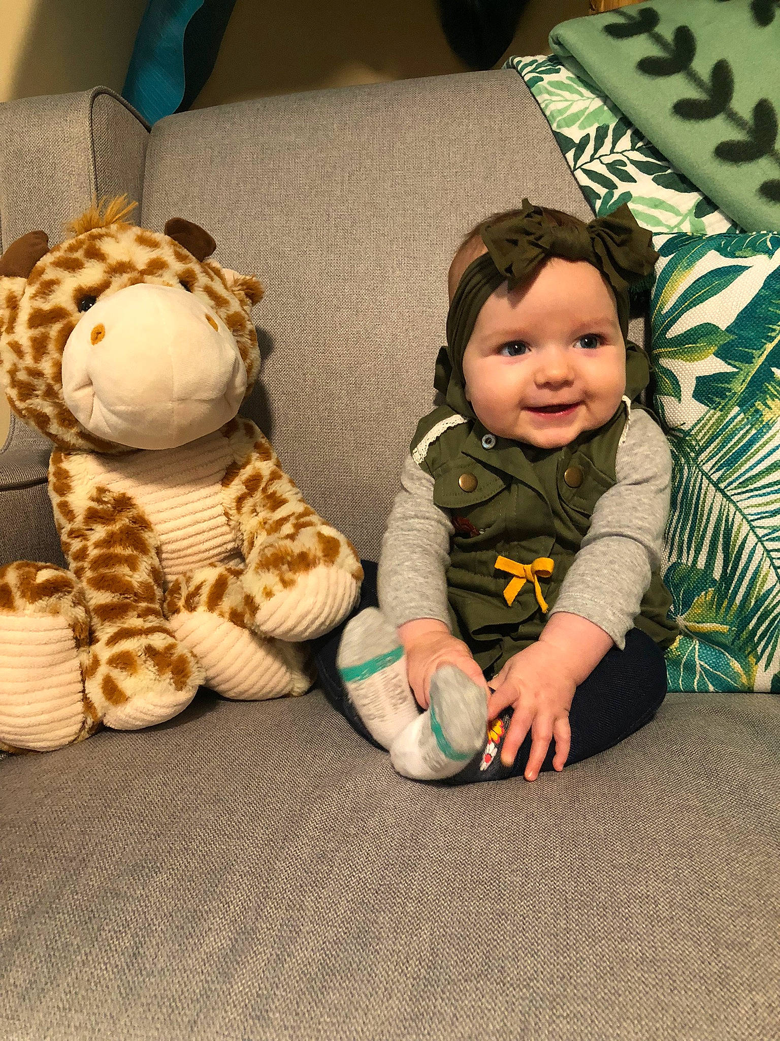 Blakely joined the competition — help win amazing prizes! baby, baby_toddler_clothing, child, comfort, eye, finger, flooring, fun, happy, head, human_body, person, room, skin, smile, stuffed_toy, teddy_bear, terrestrial_animal, toddler, toy