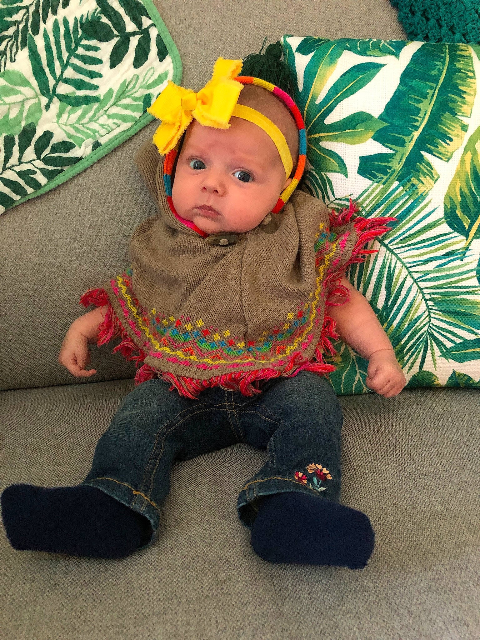 Blakely is registered to the contest to win money with this photo: baby, baby_toddler_clothing, cap, cheek, child, comfort, costume, costume_hat, fashion_accessory, flooring, fun, fur, grass, headband, headgear, headwear, lap, person, plant, sitting