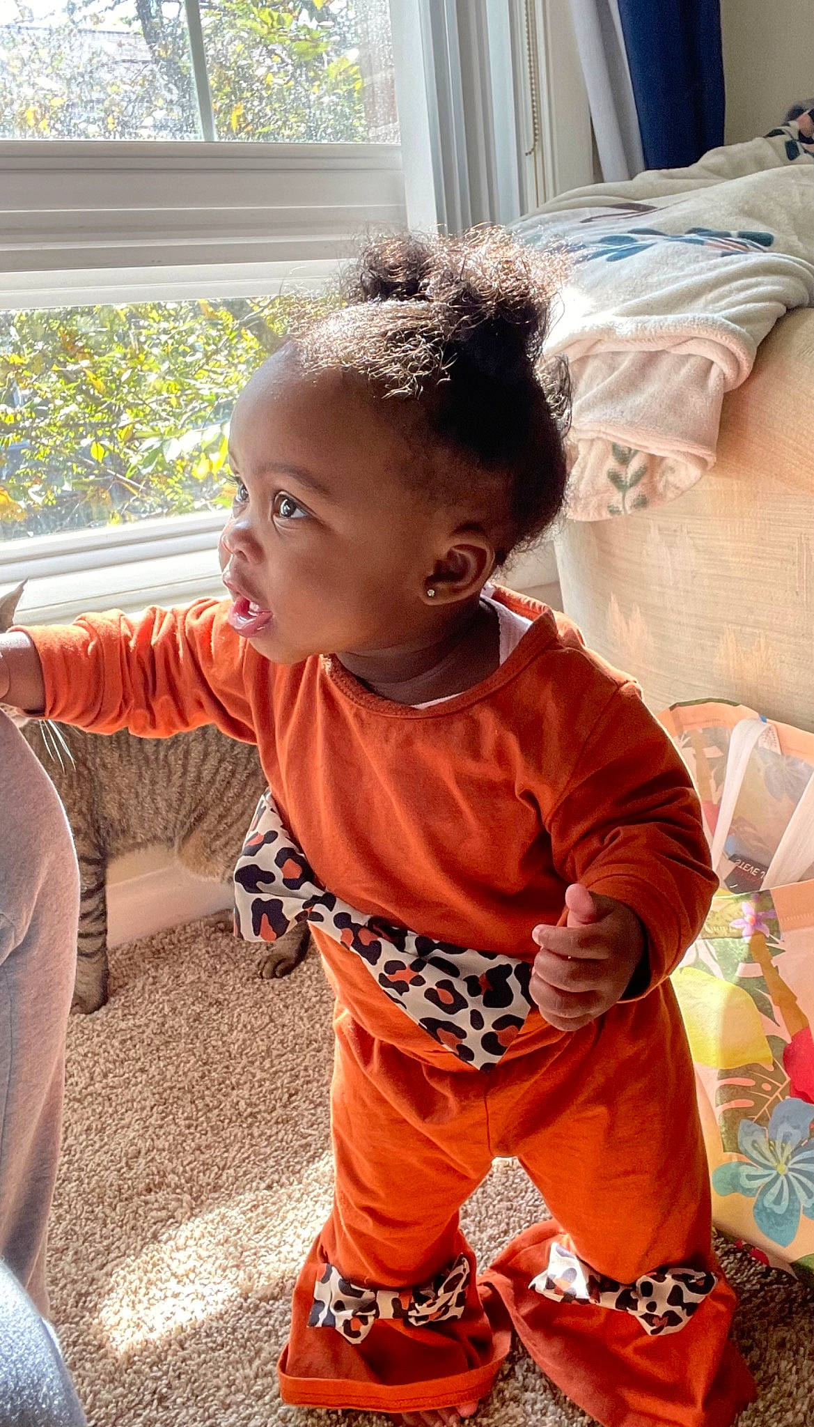 Novah joined the competition — help win amazing prizes! baby, baby_toddler_clothing, chair, cheek, child, flooring, fun, hairstyle, happy, leisure, orange, pattern, person, play, room, sitting, sleeve, t_shirt, toddler, tradition