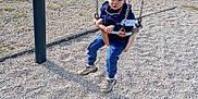 Souleyman participe au concours pour gagner de l'argent avec cette photo : boy, child, clothing, face, grass, head, jeans, male, nature, outdoorplayarea, outdoors, pants, park, person, photography, plant, playarea, portrait, swing, toy