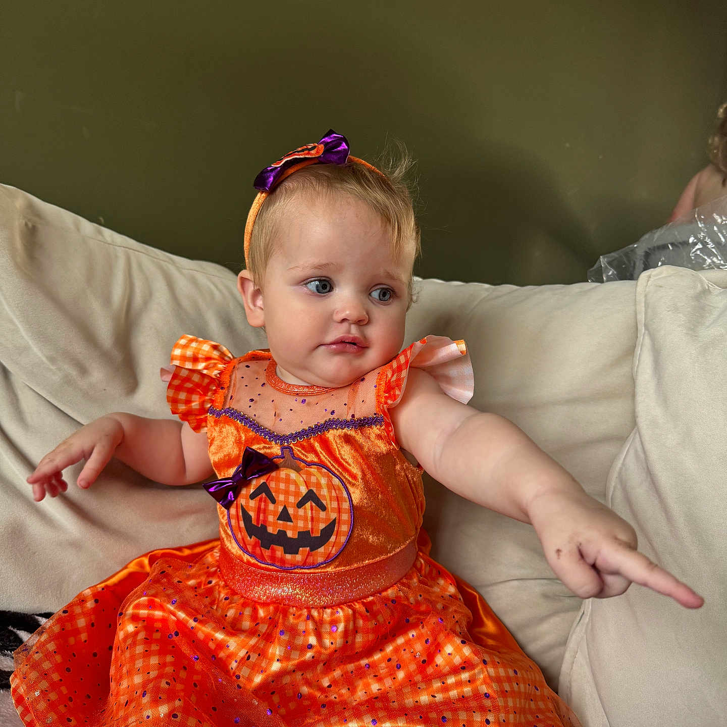 Annalise is registered to the contest to win money with this photo: architecture, baby, bodypart, building, clothing, couch, cushion, dress, eveningdress, face, finger, formalwear, furniture, hand, head, homedecor, person, photography, portrait, sitting
