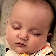 Freya is registered to the contest to win money with this photo: baby, sleeping, face, child, closeup, infant, peaceful, soft, cheeks, eyelashes, clothing, pattern, nap, portrait, cute, young, rest, indoors, head, skin