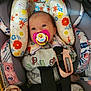 Chika joined the competition — help win amazing prizes! baby, infant, pacifier, car_seat, onesie, floral_pattern, child, cute, secured, seatbelt, pink, gray, car, toy, head_support, comfortable, clothing, sitting, indoor, young