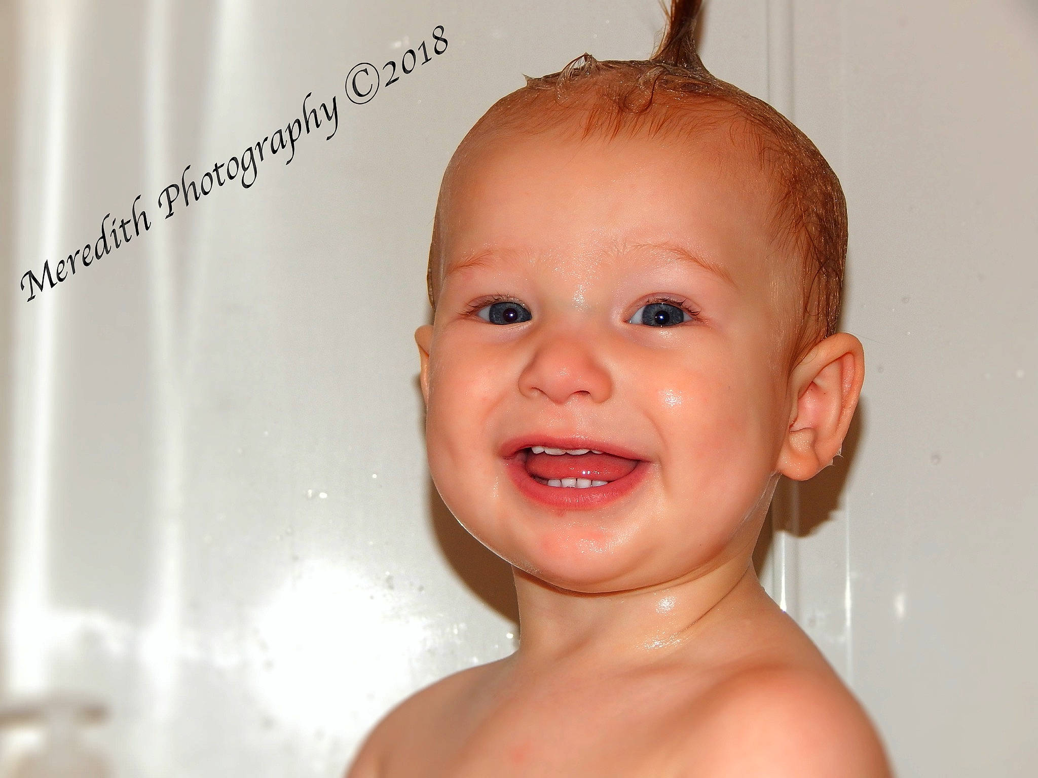 Mason is registered to the contest to win money with this photo: bathing, cheek, child, chin, close_up, ear, face, facial_expression, forehead, happiness, head, infant, joy, laughter, lip, nose, person, skin, smile, toddler