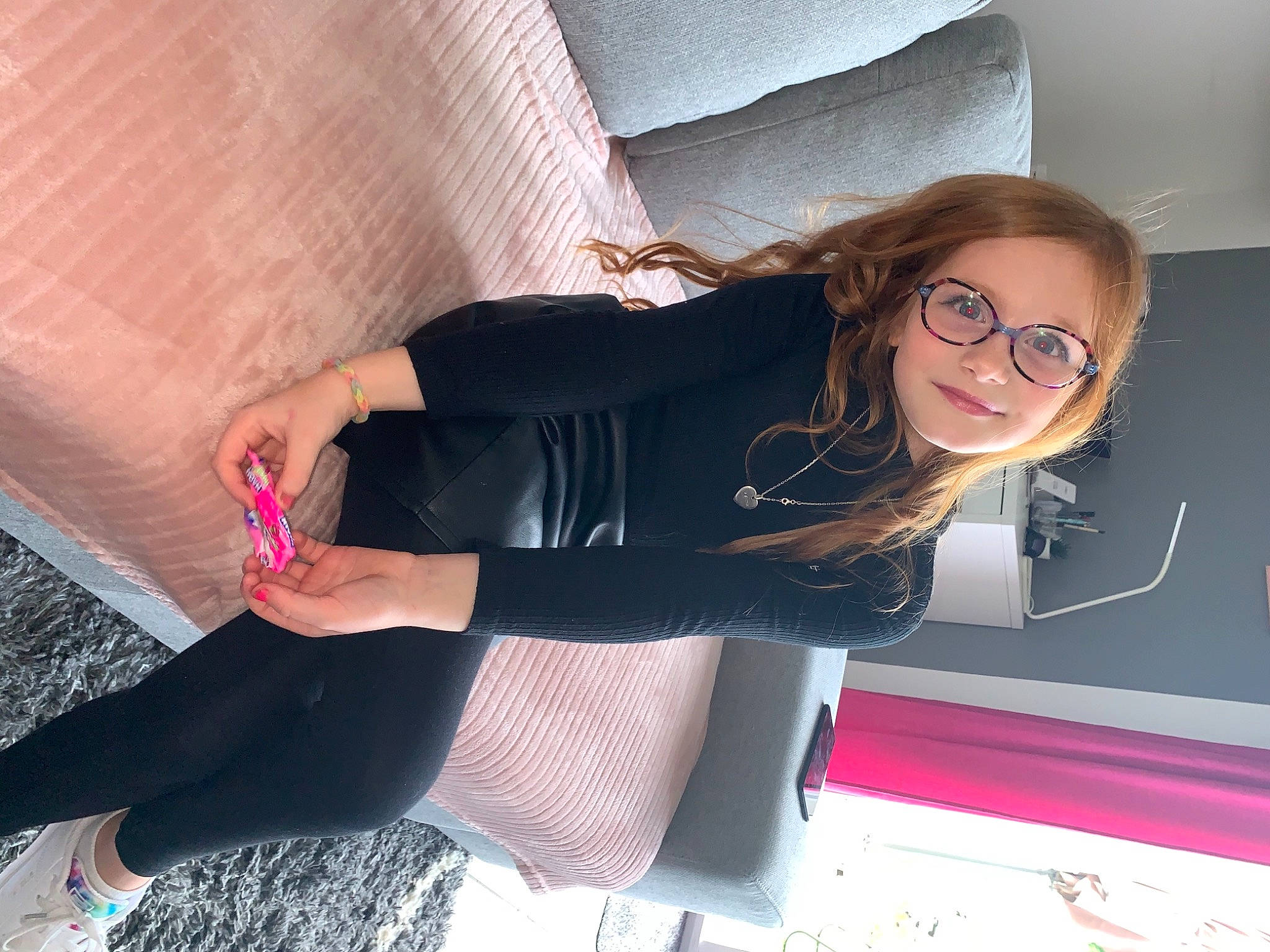 Willow participe au concours pour gagner de l'argent avec cette photo : black_hair, comfort, cool, dress, eyewear, glasses, hairstyle, human, human_body, joint, joy, knee, mouth, person, pink, shoulder, skin, sleeve, smile, thigh