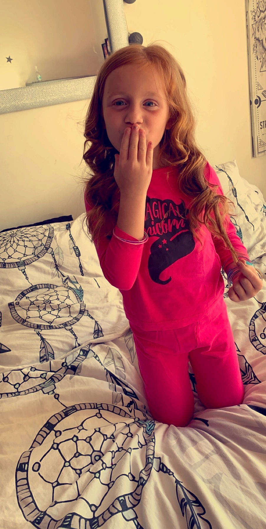 Willow participe au concours pour gagner de l'argent avec cette photo : arm, child, finger, leg, lip, long_hair, mouth, pajamas, person, photography, pink, selfie, shoulder, sleeve, t_shirt, thigh, top
