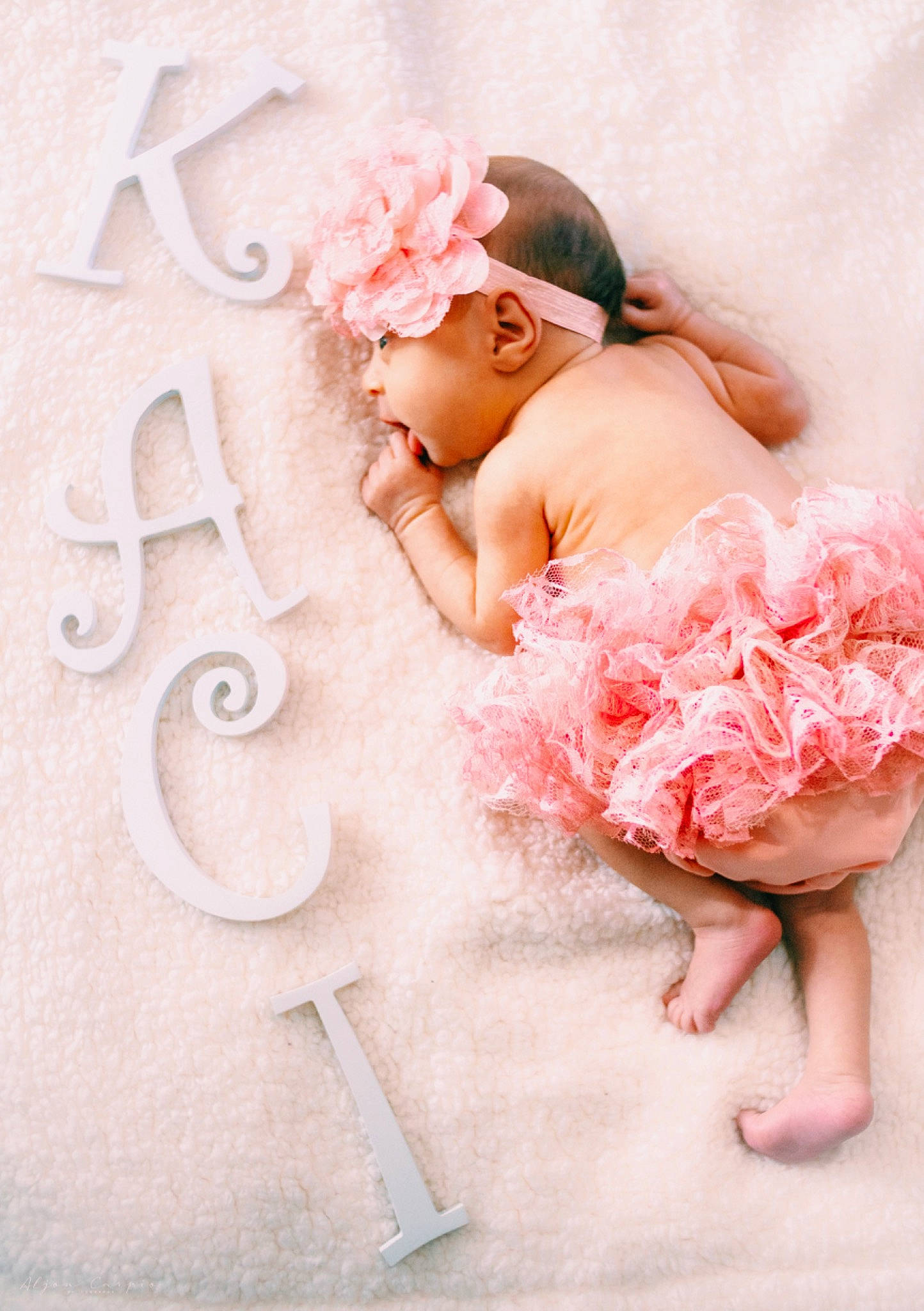 Kaci is registered to the contest to win money with this photo: baby, baby_sleeping, baby_toddler_clothing, child, costume, hair_accessory, headgear, headpiece, person, photography, pink, product, toddler
