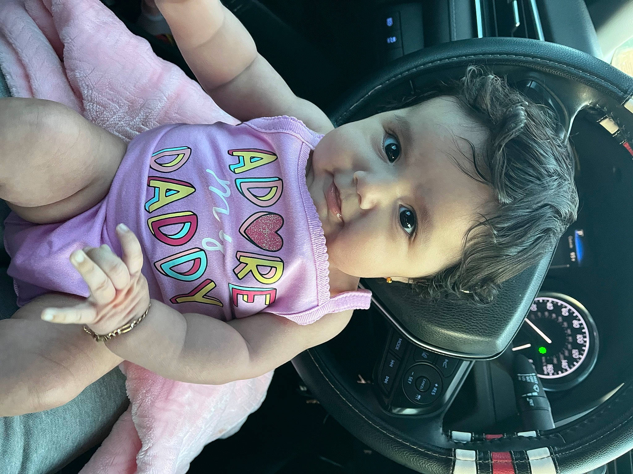 Catalina is registered to the contest to win money with this photo: baby, baby_carriage, baby_products, baby_toddler_clothing, car_seat, cheek, child, cool, drinkware, eyelash, fun, happy, iris, mouth, organ, person, purple, skin, snapshot, thigh